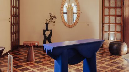 Blue 3D-printed table made from sand