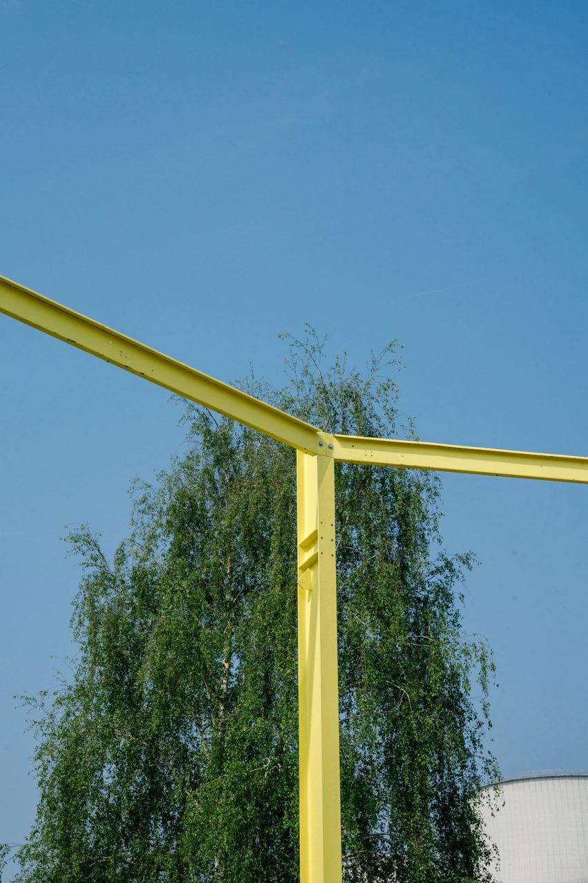 Yellow steel beams taken from on-site structure Asiat Park