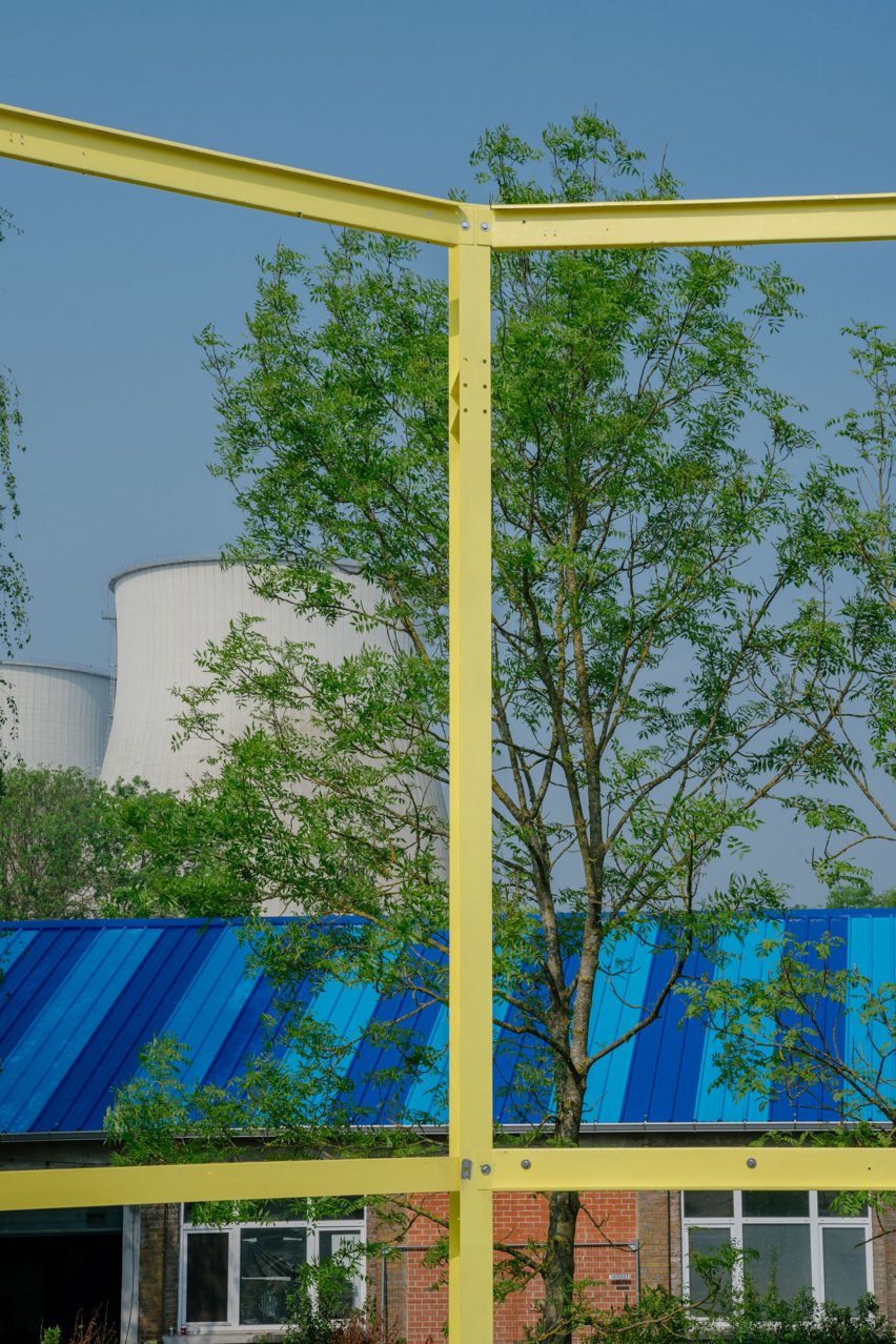 Steel structure in front of water cooler towers Horst festival Belgium