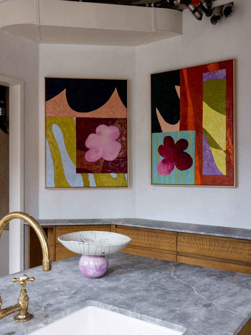 Bright paintings in kitchen