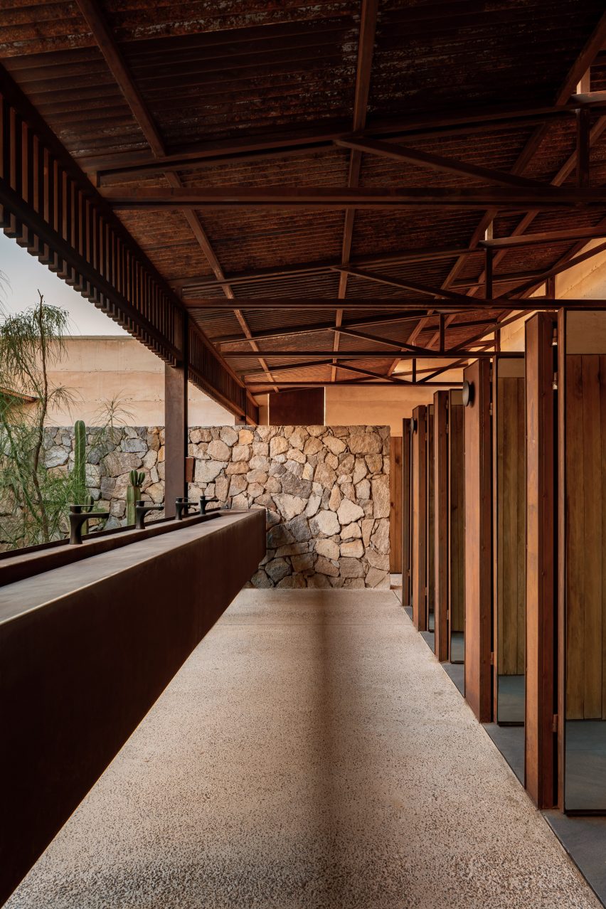 Wooden pavilion stone walls