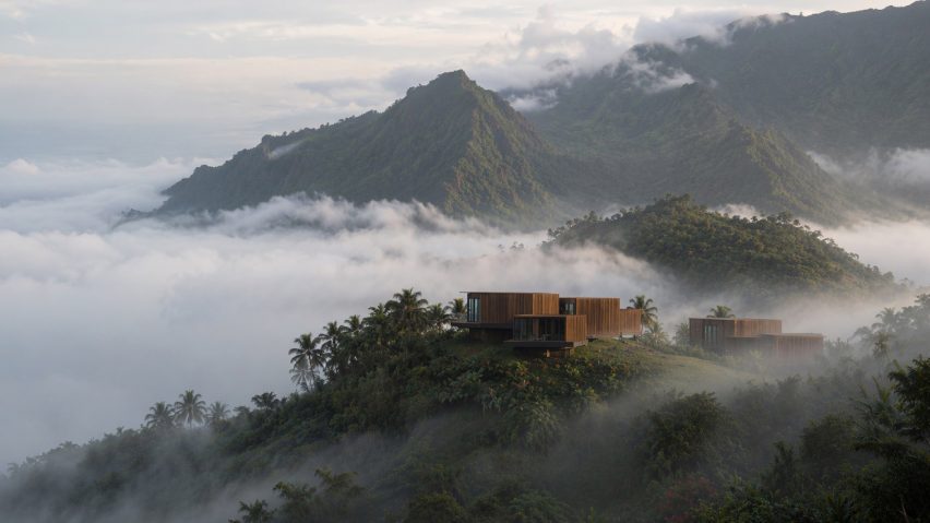 an image of a building in mountains