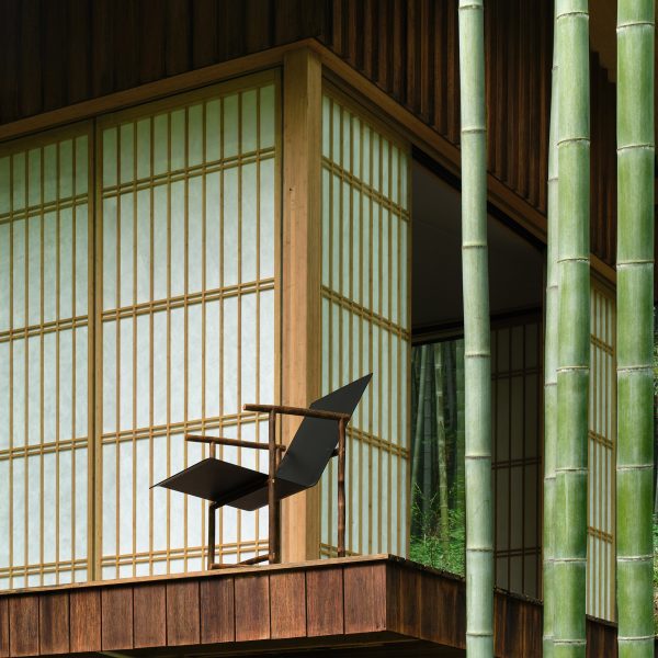 Photo of chair by Jianze surrounded by Bamboo