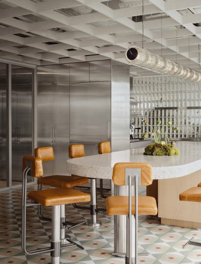 Orange bar seating with chandelier