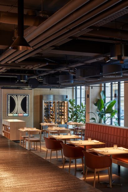 Restaurant interior with exposed services on the ceiling