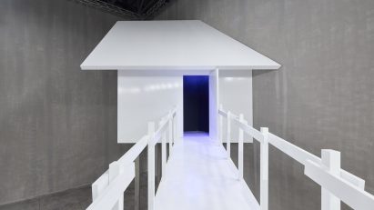 Close-up of white hut designed by AMO