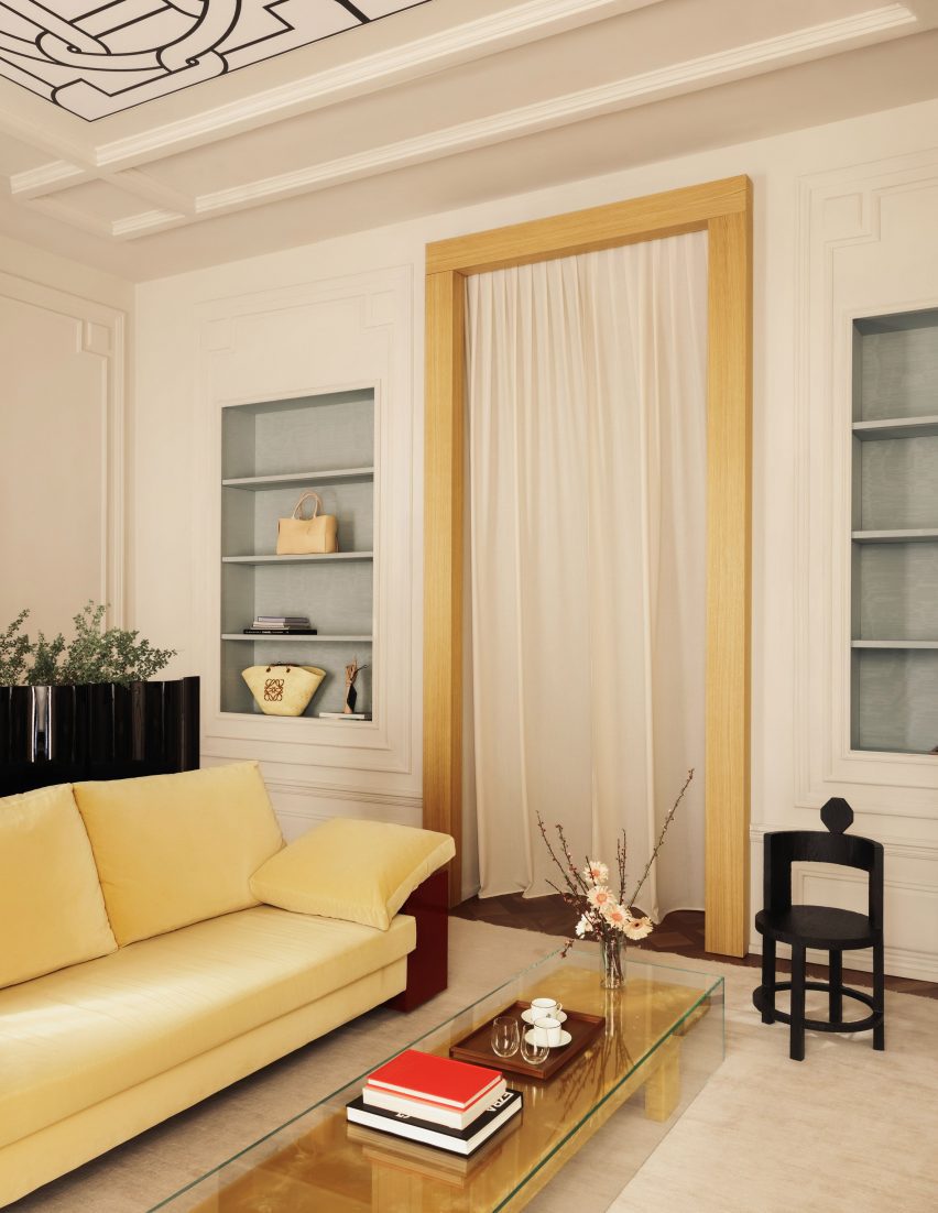 Oak framed doorway and yellow velvet sofa Boygars store
