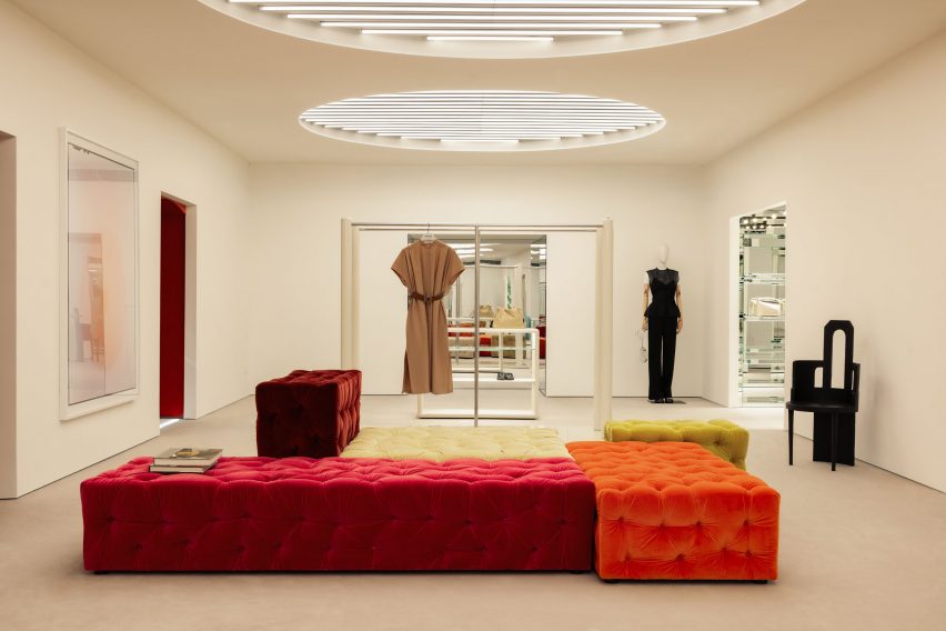 Tubular lighting inside circular ceiling niches of Boygars store