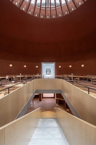 Restaurant interior at community space by AIM Architecture