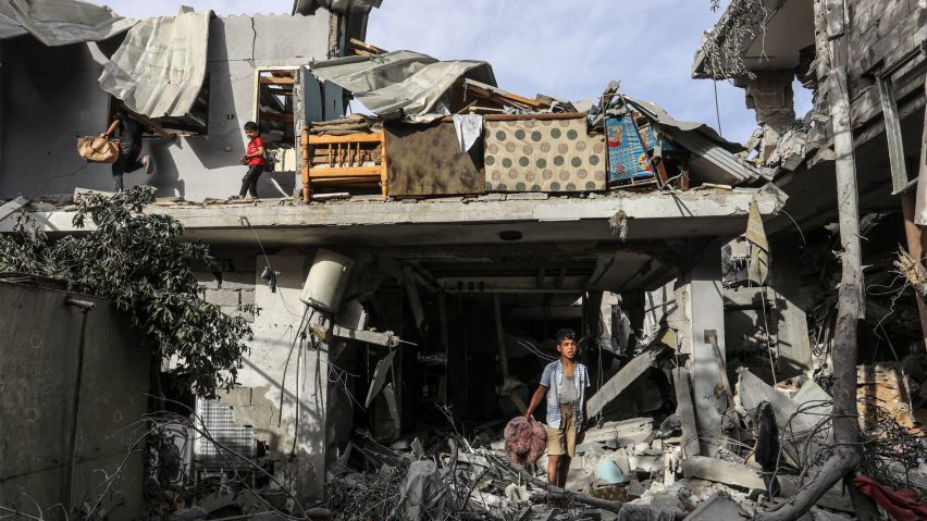 Children in a destroyed house in Rafah following an Israeli air strike in April 2024