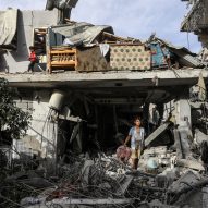Children in a destroyed house in Rafah following an Israeli air strike in April 2024