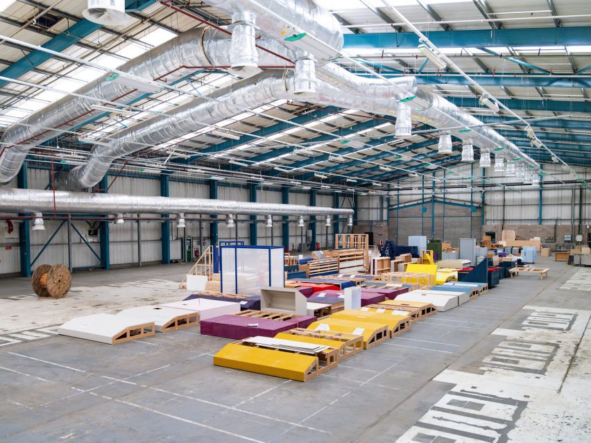 Photo of used exhibition materials being stalled in a warehouse for Dundee Design Festival