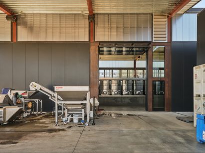 Burnished concrete flooring at the vineyard building by Clayton Korte