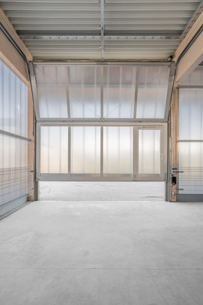 Opening within timber and polucarbonate warehouse in Germany
