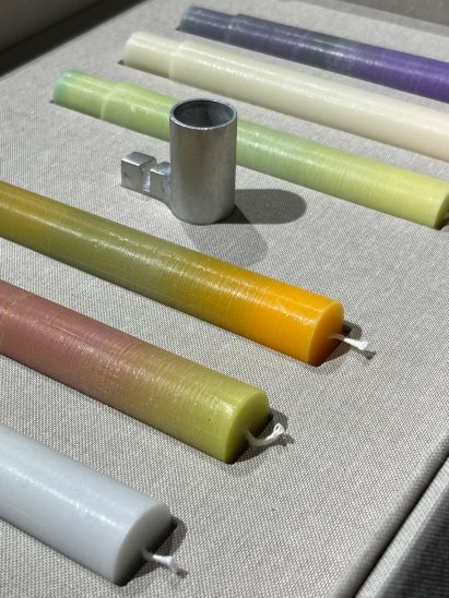Candle holder and colourful candles by Majdulin Nasrallah