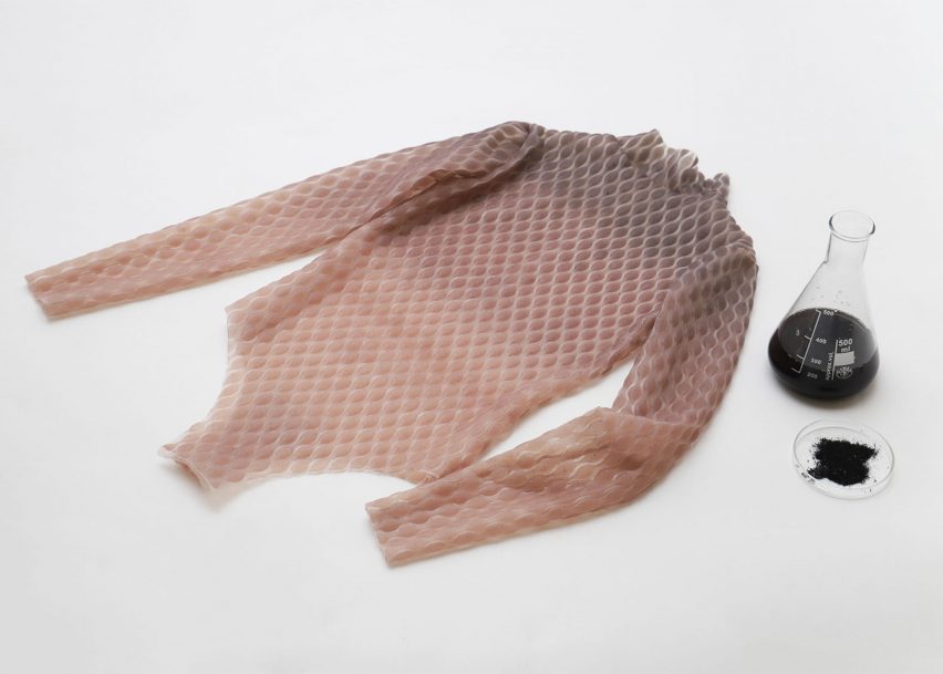 Photo of a skin-coloured leotard-like garment in a skin-coloured gradient hue
