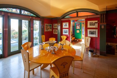 Dining space within residence by John Outram Associates