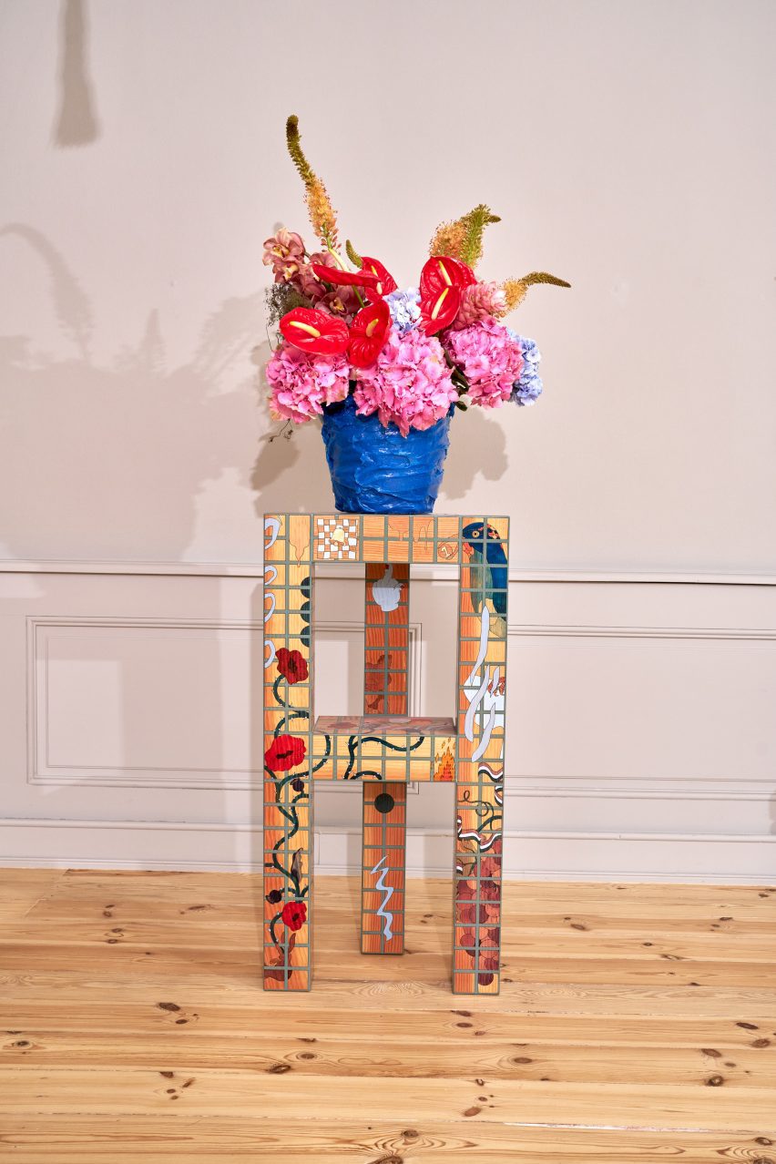 Colourful shelf with flower on it