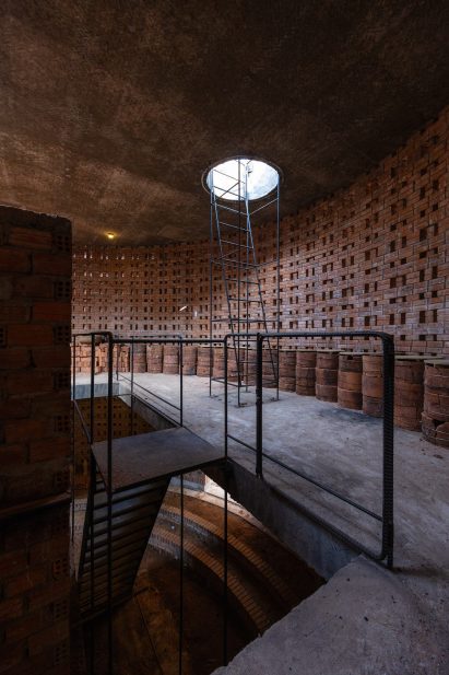 Kiln within pottery workshop by Tropical Space