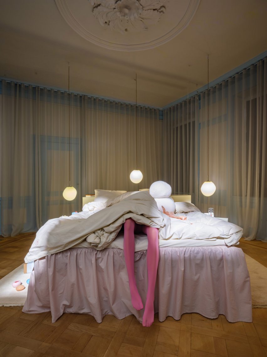 Mannequin under the sheets in a bed