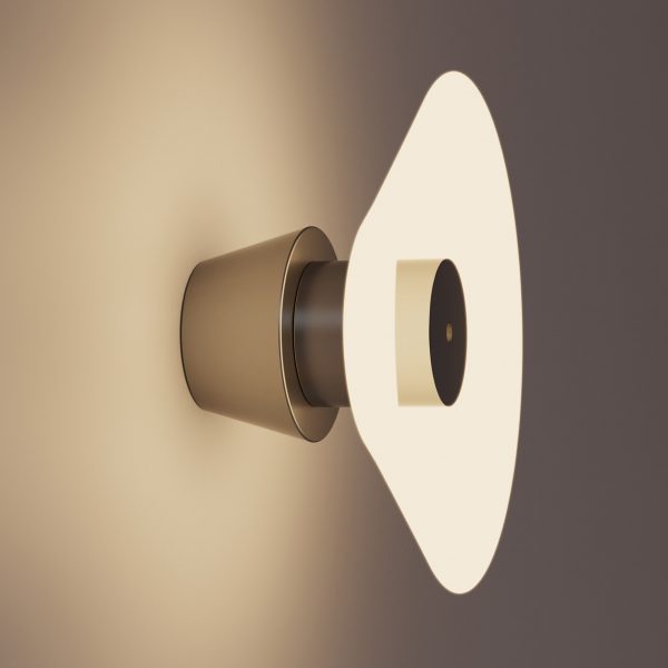 A photograph of a rounded illuminated light attached to a wall, in warm tones of beige and brown.