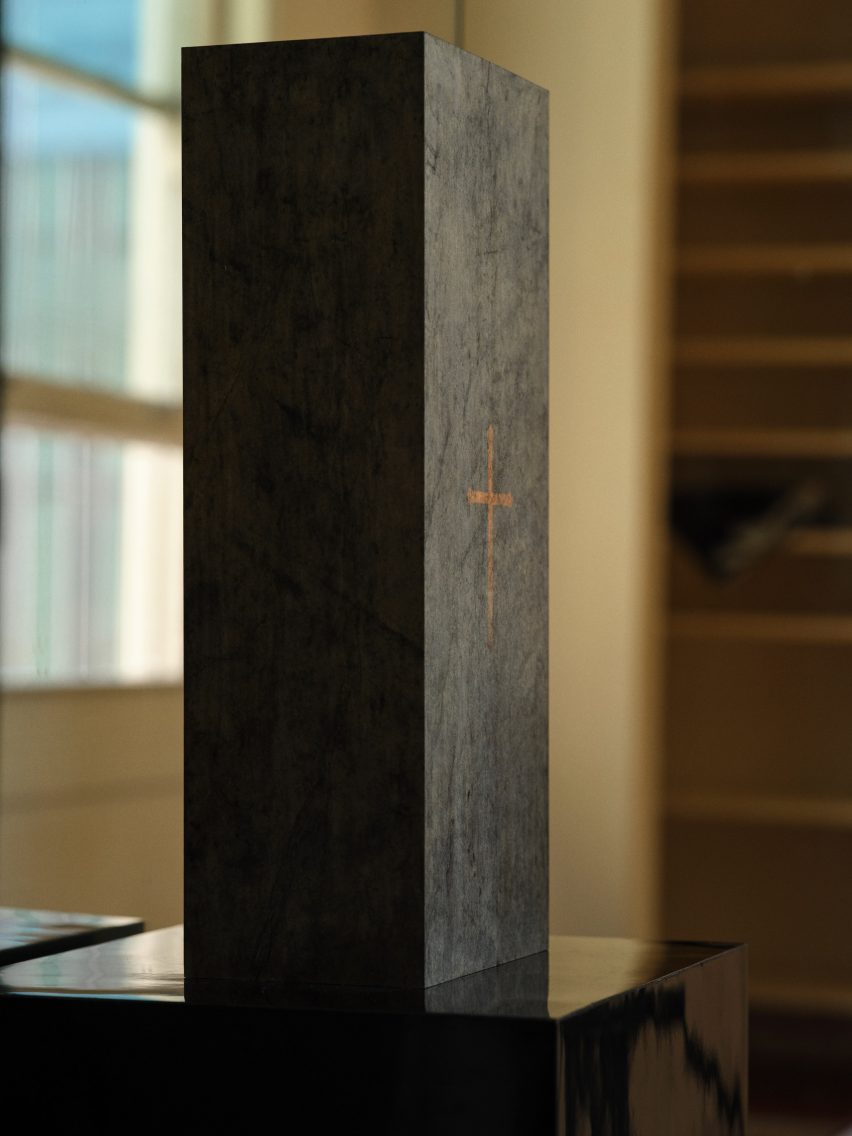 A wood box with a cross