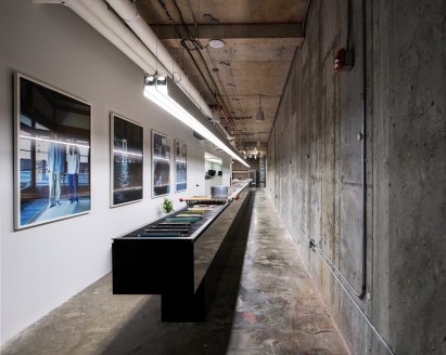 Vowels showroom in Manhattan with raw concrete and crisp white walls