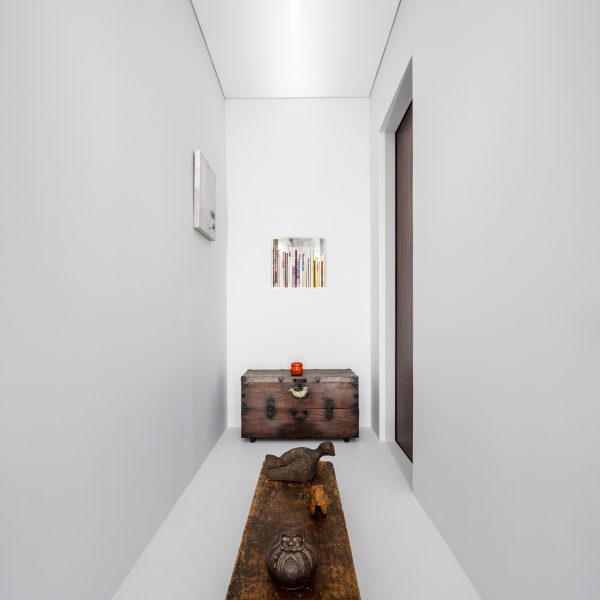 Exhibition of Edo-period Japanese furniture in a white room