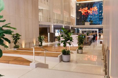 A lobby clad in white marble