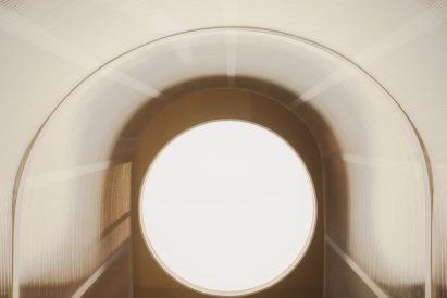 Tiny space illuminated by a circular light fixture