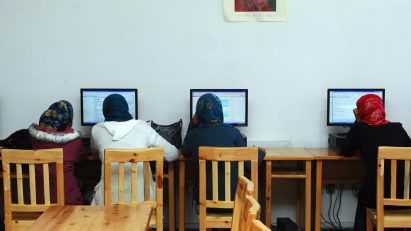 Afghan women working at computers