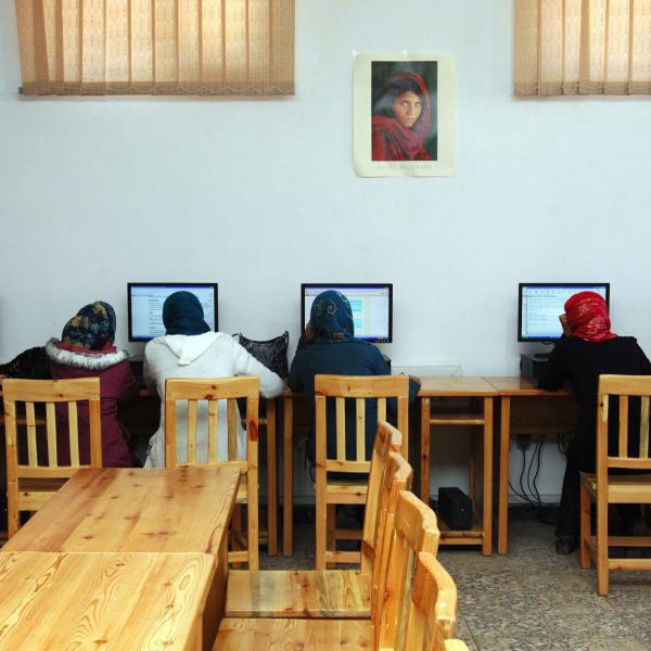 Afghan women working at computers