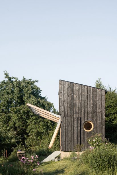 Folding facade of Garden Pavilion by Byró Architekti