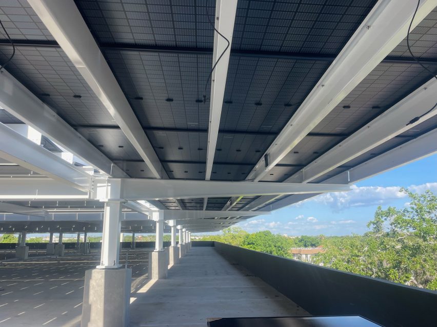 A roof with solar panels on top