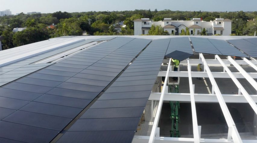 A roof with solar panels on top