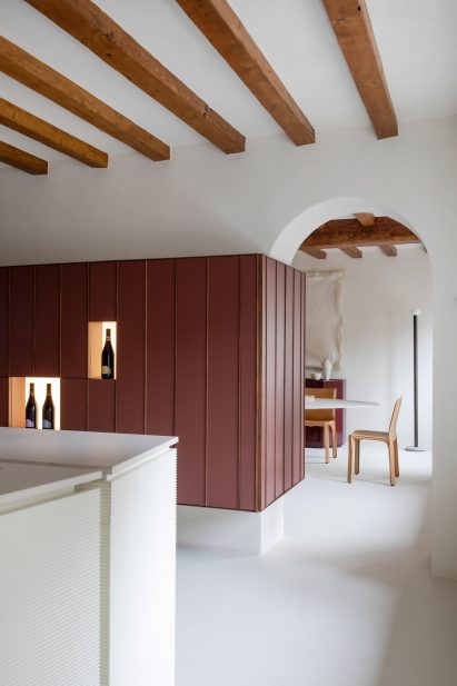 Kitchen of wine shop in Milan by Eligo Studio