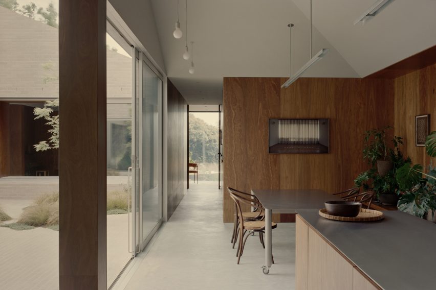 Wood-clad kitchen by Edition Office