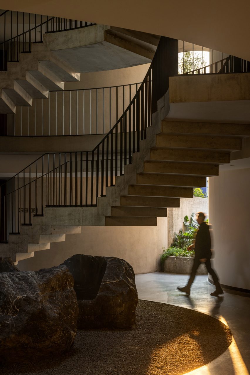 Person walking around boulders