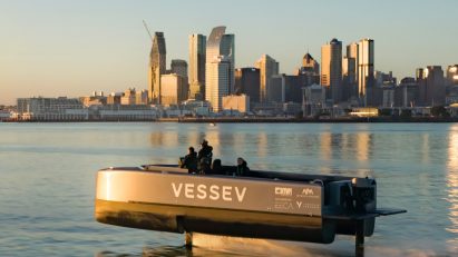 Vessev V-9 hydrofoil ferry captured via drone in front of the Auckland skyline
