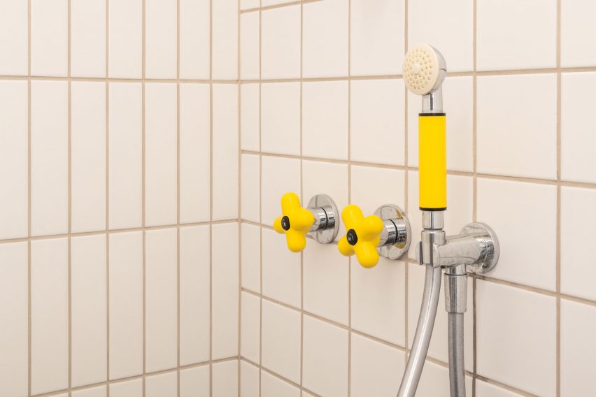 Yellow taps in Trellick apartment by Archmongers