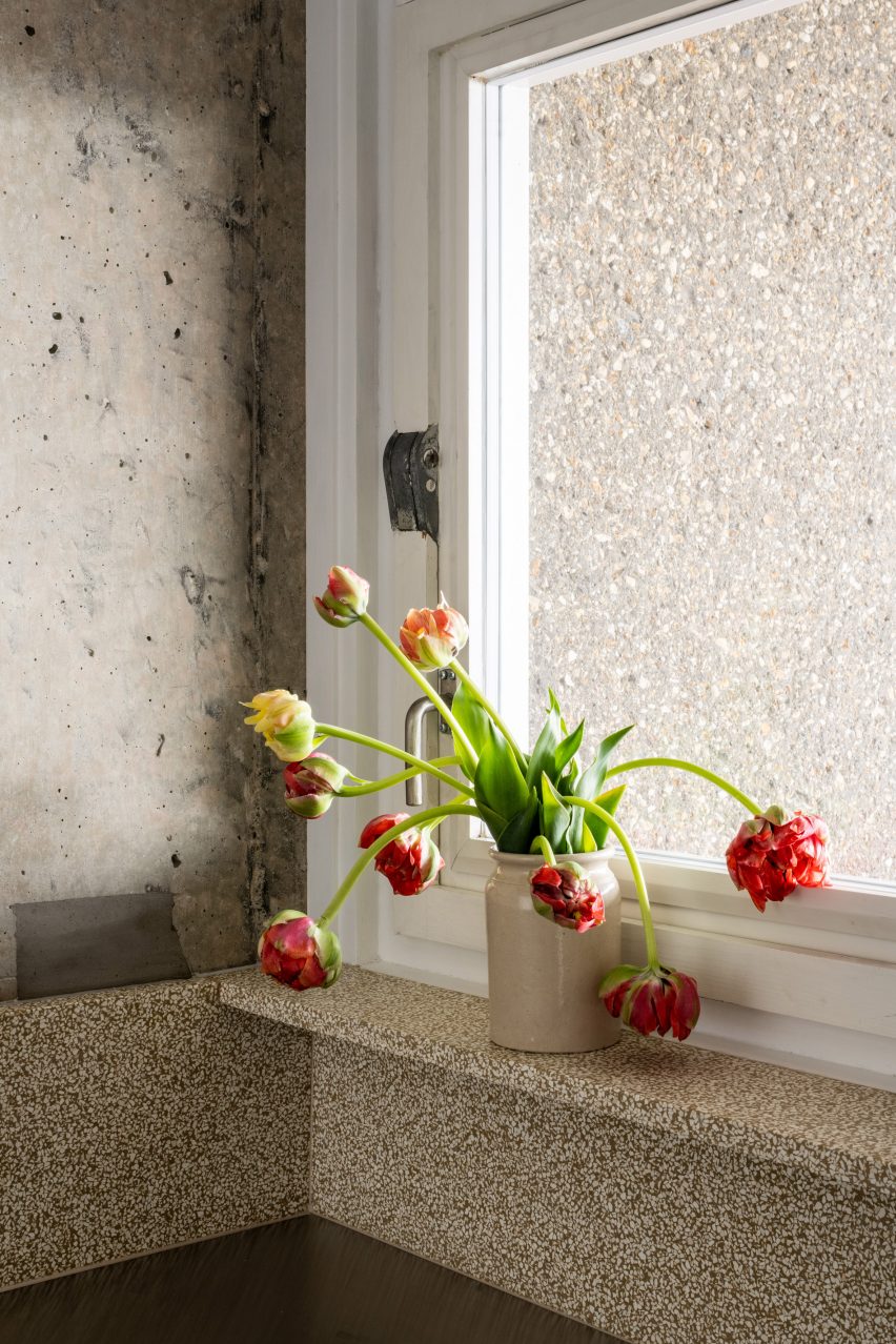 Window with flowers in Trellick apartment by Archmongers