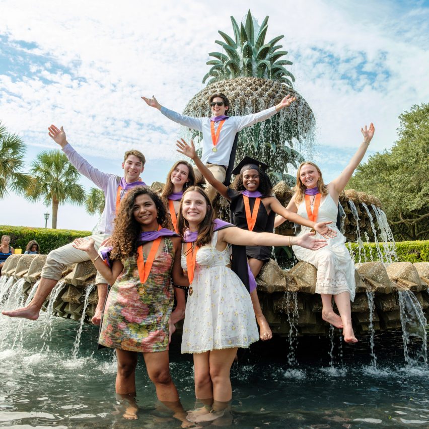 Clemson University graduates celebrating.