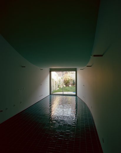 View towards rear garden at Porto home by Fala Atelier