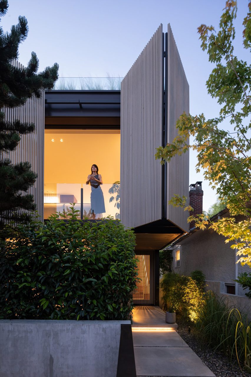 Person looking out over a balcony