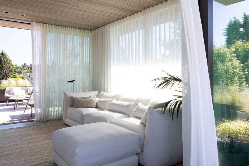 White couch in sun room