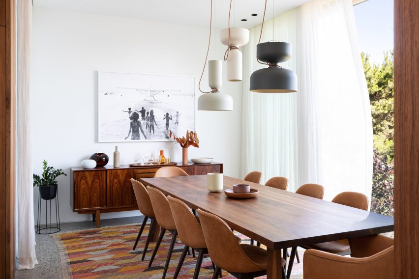 Wood table with hanging lamps