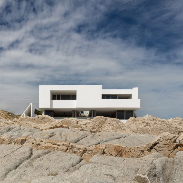 white house on mexican cliffside