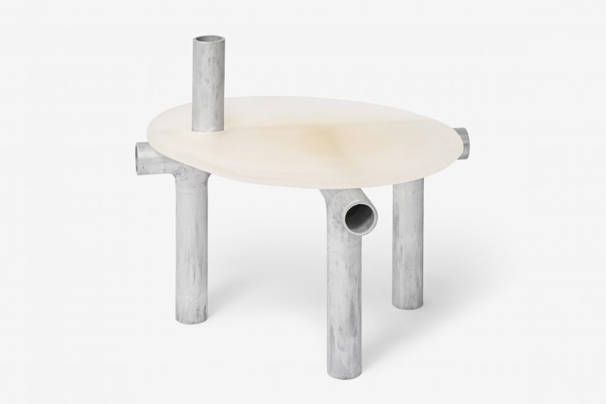 Metal and plastic item of furniture on white backdrop