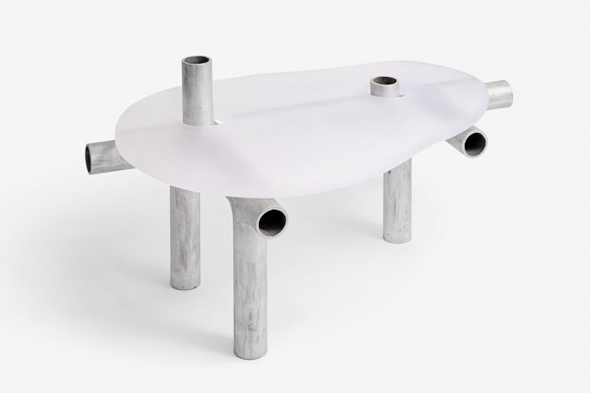 Metal and plastic item of furniture on white backdrop