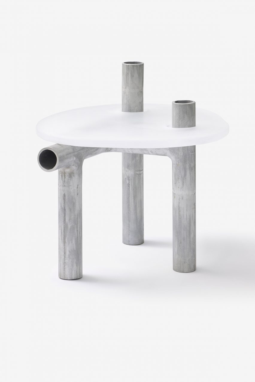 Metal and plastic item of furniture on white backdrop